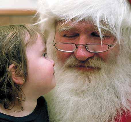Santa Claus with a child; photo courtesy Jacob Windham